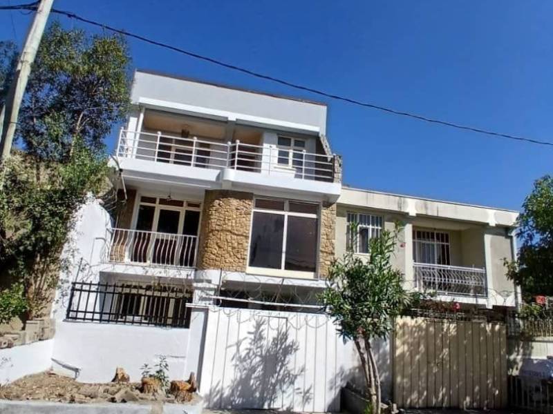 A house with a digital map is for sale.