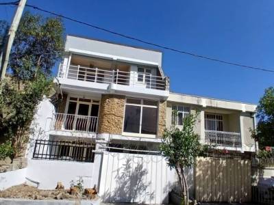 A house with a digital map is for sale.