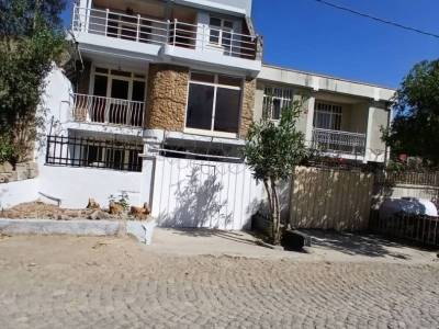 A house with a digital map is for sale.